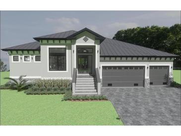 Charming single-story home featuring a 2-car garage, manicured lawn, and a welcoming front entrance at 17282 Carroway Ln, Punta Gorda, FL 33955