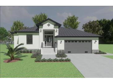 Beautiful one-story home featuring a symmetrical front elevation, gray roof, and a two-car garage at 24260 Vincent Ave, Punta Gorda, FL 33955