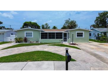 Charming single-story home with a well-maintained lawn and inviting curb appeal at 5672 62Nd N Way, St Petersburg, FL 33709