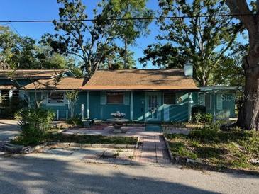 Charming single-story home with a well-manicured front yard and inviting facade at 5680 77Th N Ave, Pinellas Park, FL 33781