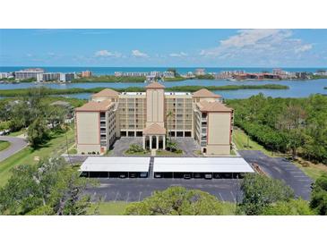 Beautiful waterfront condo complex with ample parking and gorgeous ocean views at 9000 Commodore Dr # 606, Seminole, FL 33776