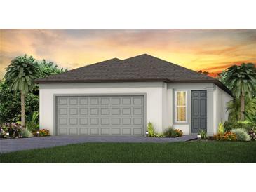 Inviting single-Gathering home featuring a two-car garage, neutral paint, and a well-maintained lawn in a desirable community at 9515 Coastline Way, Parrish, FL 34219