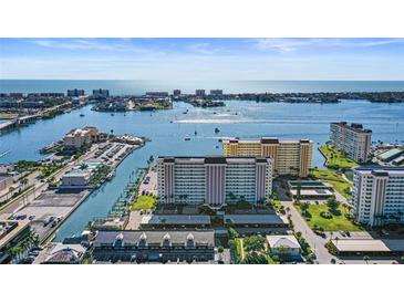 Beautiful waterfront condos on the Gulf Coast with boat docks and stunning ocean views on a clear sunny day at 4550 Cove Cir # 1003, St Petersburg, FL 33708