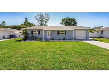 Charming single-story home with a well-maintained lawn and inviting curb appeal at 6490 22Nd S St, St Petersburg, FL 33712