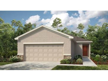 Charming single-Gathering home boasting a two-car garage and complemented by lush landscaping, providing curb appeal at 12469 Gust Ct, Hudson, FL 34669