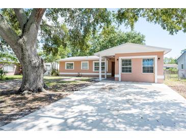 Charming single-story home with a large front yard and spacious driveway at 2121 23Rd Sw St, Largo, FL 33774