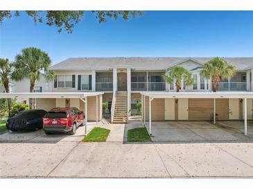 Inviting condo with assigned parking and landscaped surroundings providing a comfortable living experience at 404 Laurel Lake Dr # 101, Venice, FL 34292