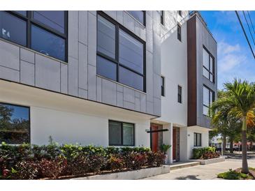 Modern townhome with clean lines, large windows, and professional landscaping at 820 2Nd N Ave, St Petersburg, FL 33701