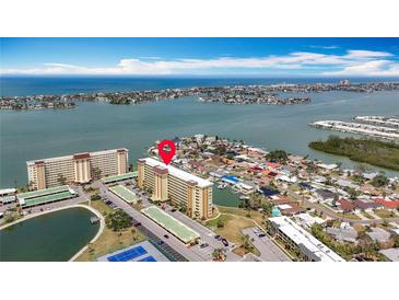 Aerial view of the condo complex near the intercoastal waterways and beachfront of Florida at 4725 Cove Circle # 908, St Petersburg, FL 33708