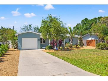 Charming single-story home with a well-manicured front yard and driveway at 743 43Rd Ne Ave, St Petersburg, FL 33703