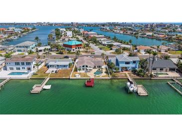 Waterfront homes featuring private docks and easy ocean access for boating and recreational activities at 600 115Th Ave, Treasure Island, FL 33706