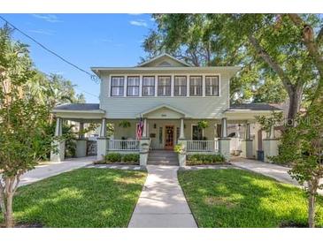Charming two-story home with a welcoming front porch and well-maintained landscaping at 3114 W Granada St, Tampa, FL 33629