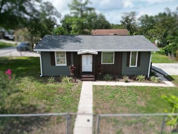 Charming single-story home boasts fresh paint, a new roof, and tidy landscaping at 37045 North Ave, Dade City, FL 33523