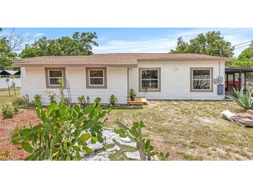 Charming single-story home featuring desert landscaping and a well-maintained exterior at 2233 Rightaway Ln, Plant City, FL 33565
