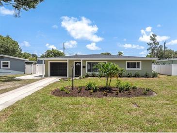 Charming single-story home with a well-manicured lawn and inviting curb appeal at 5685 35Th N Ave, St Petersburg, FL 33710