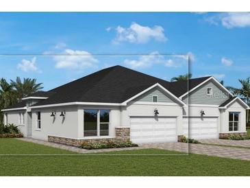 Exterior elevation with an attached two car garage, black roof and manicured lawn at 2824 Marrakesh Ln, Sarasota, FL 34234