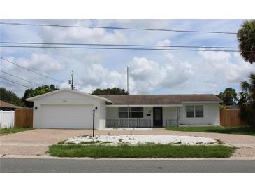Charming single-story home with attached garage and well-maintained landscaping at 6081 22Nd N Ave, St Petersburg, FL 33710