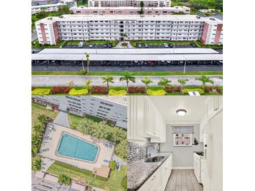 A multi-story condominium complex showcases manicured landscaping and covered parking at 5501 80Th N St # 206, St Petersburg, FL 33709