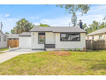 Charming single-story home boasts a well-maintained lawn and inviting curb appeal, perfect for a cozy living at 5622 Tangerine S Ave, Gulfport, FL 33707
