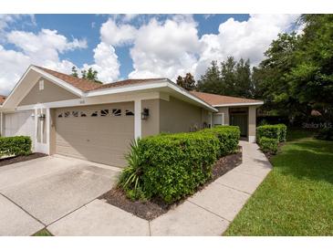 Charming single-story home with a well-maintained lawn and a two car garage at 4228 Silver Star Dr, Spring Hill, FL 34609