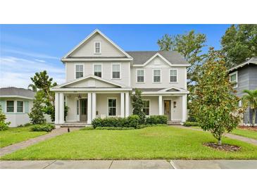 Charming two-story home with a manicured lawn and inviting curb appeal at 334 11Th Ne Ave, St Petersburg, FL 33701