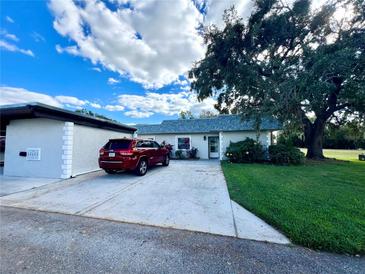 Charming single-story home with well-maintained lawn, mature landscaping and private driveway at 3725 Teeside Dr, New Port Richey, FL 34655
