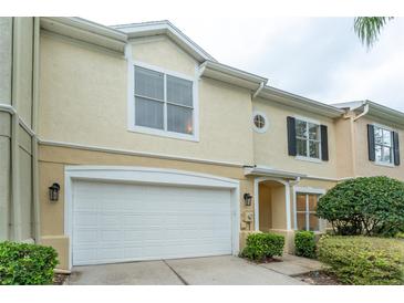 Well kept home with attached garage and beautiful Florida landscaping at 3415 Heards Ferry Dr, Tampa, FL 33618