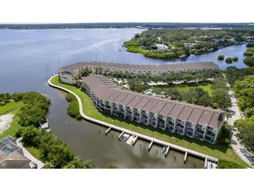 Waterfront condos boast private docks and beautiful water views from multiple units at 115 Brent Cir, Oldsmar, FL 34677