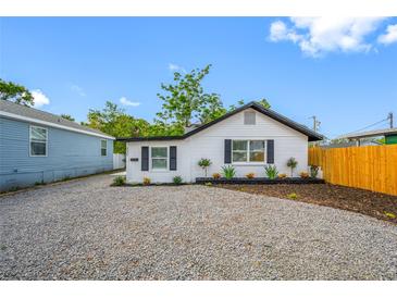 Charming home featuring new gravel and front garden with stylish black shutters at 4626 8Th S Ave, St Petersburg, FL 33711