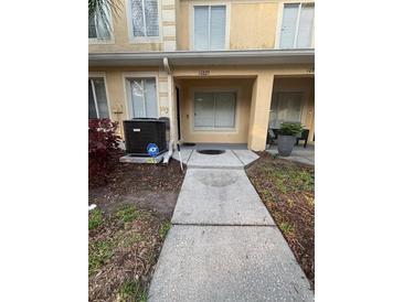 Inviting exterior of home showcasing well-maintained landscaping and architectural details at 10823 Brickside Ct, Riverview, FL 33579