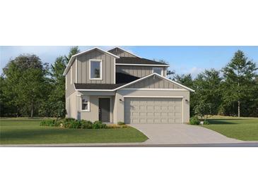 Charming two-story home showcasing a traditional design, landscaped yard, and an attached two-car garage at 11678 Brae Way, Dade City, FL 33525