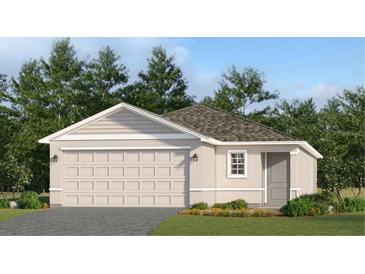Charming single-story home featuring a two-car garage and neutral-colored exterior with well-maintained landscaping at 3707 Ambersweet Xing, Parrish, FL 34219