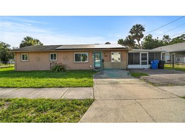 Charming single-story home with a spacious front yard, solar panels and large driveway at 2501 18Th S Ave, St Petersburg, FL 33712