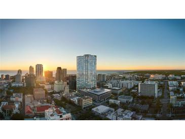 Stunning aerial view of a luxury condo building overlooking the beautiful city skyline and waterfront at 400 Central Ave # 2705, St Petersburg, FL 33701