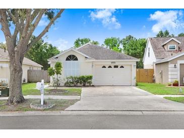 Charming one-story home featuring a well-maintained lawn and inviting curb appeal at 6801 Summer Cove Dr, Riverview, FL 33578