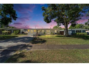 Charming single-story home with a well-maintained front yard and mature trees in a quiet neighborhood at 6554 34Th N Ave, St Petersburg, FL 33710