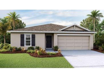 Charming single-story home with a manicured lawn, complemented by lush landscaping and a two-car garage at 3071 Pink Gerbera Sq, Plant City, FL 33566