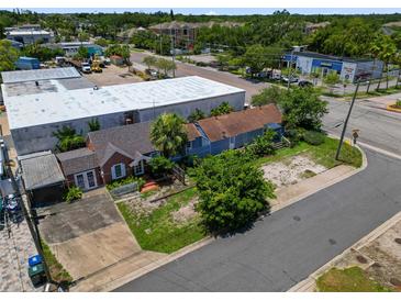 Charming neighborhood featuring colorful homes and lush greenery at 703/709 Patterson St, Clearwater, FL 33756