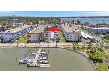 Waterfront condo complex with boat docks and bay views near the Gulf of Mexico at 3114 59Th S St # 101, Gulfport, FL 33707