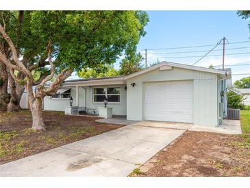 Charming single-story home with a well-maintained front yard and attached one car garage, perfect for first-time home buyers at 3547 Morley Dr, New Port Richey, FL 34652