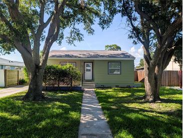 Charming single-story home with a well-maintained front yard and mature shade trees at 5725 18Th S Ave, Gulfport, FL 33707
