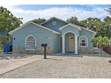 Charming one-story home with a stone facade and well-maintained landscaping at 3201 36Th N Ave, St Petersburg, FL 33713