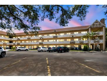 Charming three-story condo building with balconies and ample parking at 2311 Brisbane St # 45, Clearwater, FL 33763