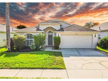 Charming single-Gathering home with a well-manicured lawn and a two-car garage at 4510 Beaumaris Dr, Land O Lakes, FL 34638