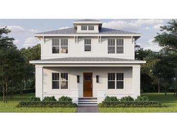 Charming two-story home featuring white wood siding and a welcoming front porch at 2910 11Th N St, St Petersburg, FL 33704