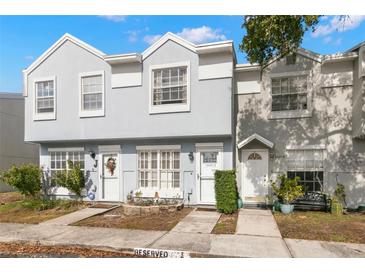 Charming townhome featuring well-maintained landscaping, and reserved parking out front at 6681 121St Ave # I, Largo, FL 33773