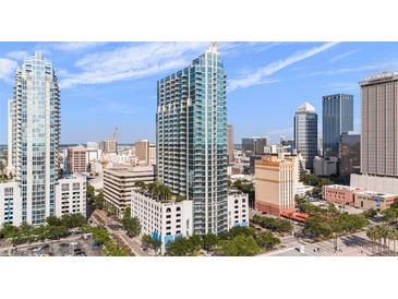 Luxury high-rise condo building in an urban city setting with blue skies and city views at 777 N Ashley Dr # 1903, Tampa, FL 33602