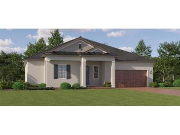 Charming single-Gathering home with a well-manicured lawn and a welcoming facade at 31616 Cardinal Yard Dr, San Antonio, FL 33576