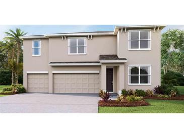 Charming two-story home with a three-car garage, well-manicured lawn, and tasteful landscaping at 19727 Gladeview Way, Land O Lakes, FL 34638