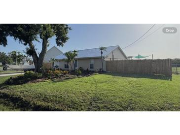 Charming home featuring a well-manicured lawn and tasteful landscaping enhancing curb appeal at 2306 41St E St, Bradenton, FL 34208